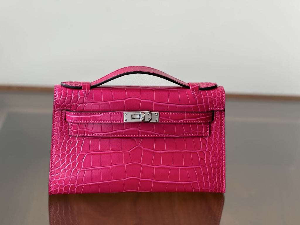 Hermès Rose Extreme Mini Kelly Pochette of Shiny Mississippiensis Alligator Palladium Hardware