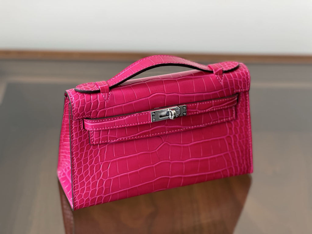 Hermès Rose Extreme Mini Kelly Pochette of Shiny Mississippiensis Alligator Palladium Hardware