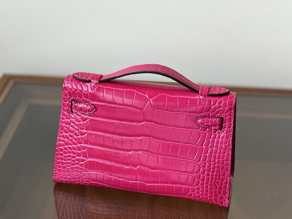 Hermès Rose Extreme Mini Kelly Pochette of Shiny Mississippiensis Alligator Palladium Hardware