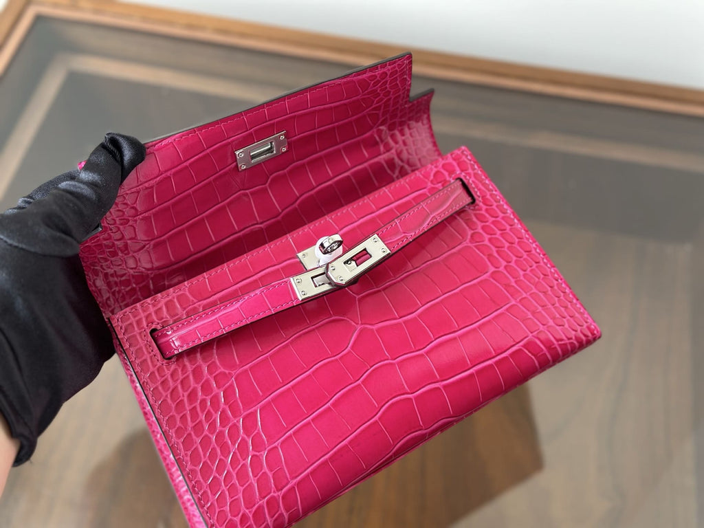 Hermès Rose Extreme Mini Kelly Pochette of Shiny Mississippiensis Alligator Palladium Hardware