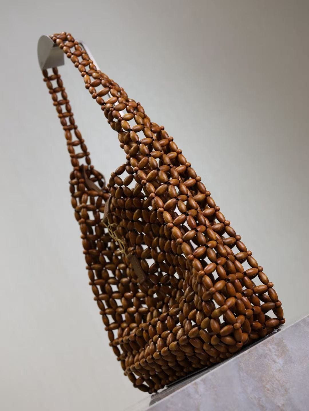SAINT LAURENT LE 5 À 7 large in wood beads