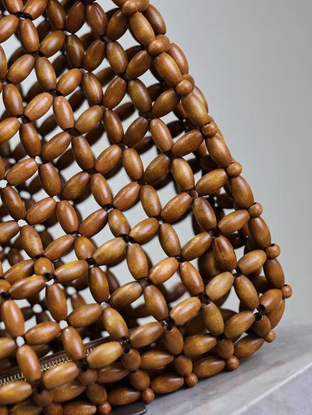SAINT LAURENT LE 5 À 7 large in wood beads