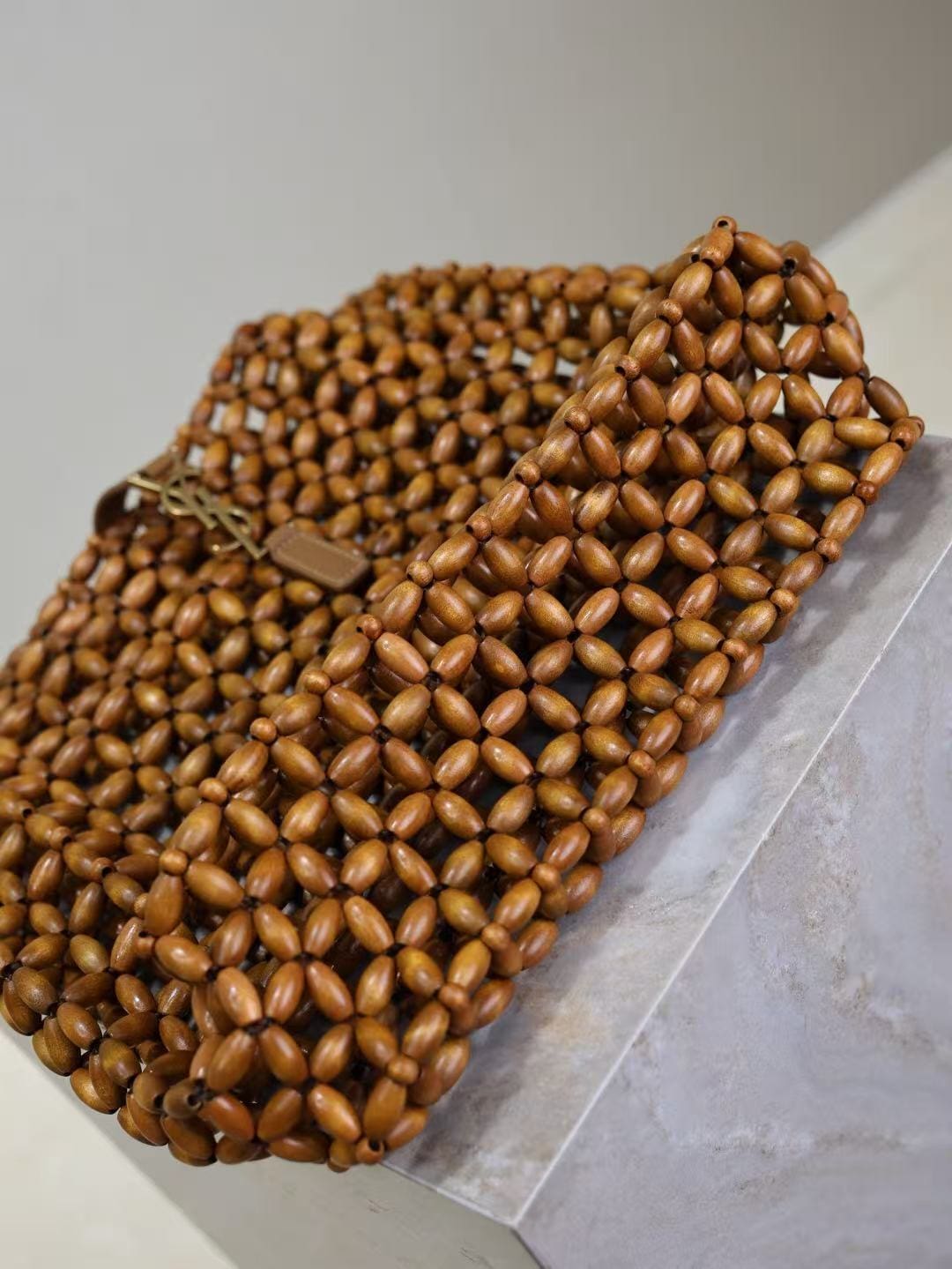 SAINT LAURENT LE 5 À 7 large in wood beads