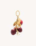 SAINT LAURENT CASSANDRE cherry bag charm in resin and metal